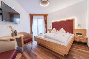 TV a/nebo společenská místnost v ubytování Hotel Meinhardt