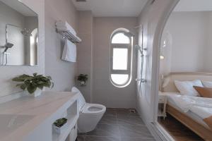 Baðherbergi á Jodi Dalat Hotel