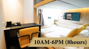 ST Signature Tanjong Pagar, DAYUSE, 8 hours, 10AM-6PM客房内的一张或多张床位