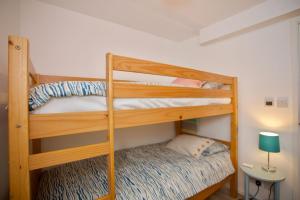 a bunk bed room with two bunk beds in it at Chalet Fiftynine in Deal