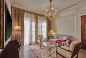 a living room with a couch and a table at Mementos by ITC Hotels Jaipur in Jaipur