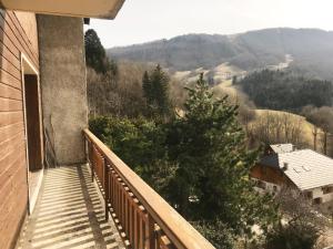 a balcony with a view of the mountains at Edelweiss in Aillon-le-Jeune