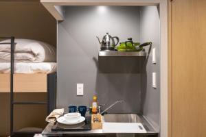 A kitchen or kitchenette at HOTEL HARE BARE 3min walk from Kiba Station