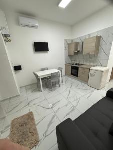 Η κουζίνα ή μικρή κουζίνα στο Binario104