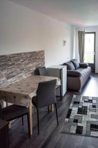 Un lugar para sentarse en Apartamente Ambrus Praid