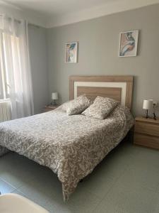 Postel nebo postele na pokoji v ubytování Apartamento Portbou