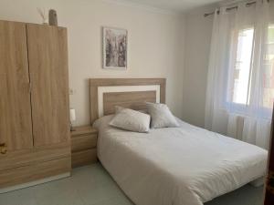 Postel nebo postele na pokoji v ubytování Apartamento Portbou