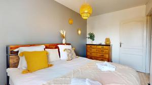 Postel nebo postele na pokoji v ubytování L'alsacienne