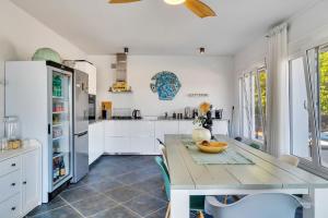 Kuchyň nebo kuchyňský kout v ubytování Casa la Naranja Boutique B&B