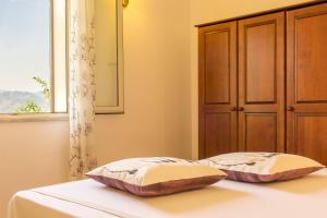 Posteľ alebo postele v izbe v ubytovaní A casa dù Rumanu - Taormina