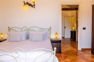 Posteľ alebo postele v izbe v ubytovaní A casa dù Rumanu - Taormina