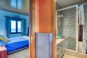 Ένα ή περισσότερα κρεβάτια σε δωμάτιο στο Sara