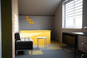 Зона вітальні в Готельні кімнати Bodro Clinic