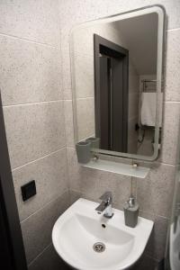 Koupelna v ubytování Готельні кімнати Bodro Clinic