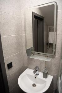 Ванна кімната в Готельні кімнати Bodro Clinic +9 фото
