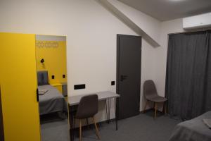 Ліжко або ліжка в номері Готельні кімнати Bodro Clinic