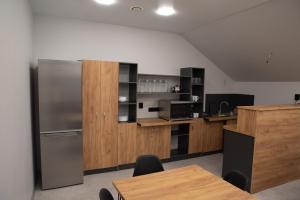Кухня або міні-кухня у Готельні кімнати Bodro Clinic