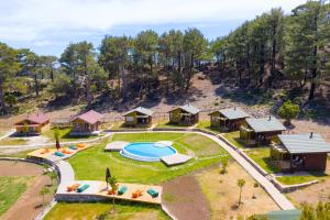 an aerial view of a resort property with a swimming pool at Babakamp Eco Ranch & Retreat in Muğla