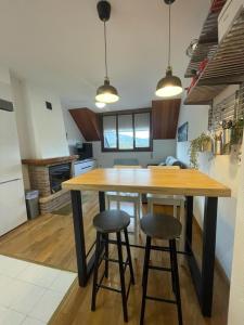 Η κουζίνα ή μικρή κουζίνα στο Apartamento Alba4 +7 φωτογραφίες