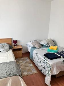 Postel nebo postele na pokoji v ubytování App Martina