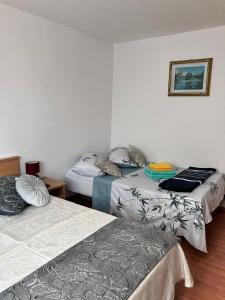 Postel nebo postele na pokoji v ubytování App Martina