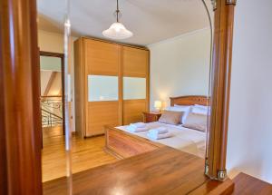 Postel nebo postele na pokoji v ubytování Utopia Beach Villa