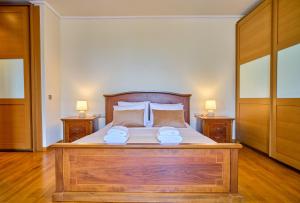 Postel nebo postele na pokoji v ubytování Utopia Beach Villa