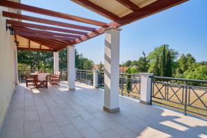 Balkón nebo terasa v ubytování Utopia Beach Villa