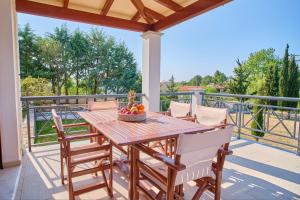 Balkón nebo terasa v ubytování Utopia Beach Villa