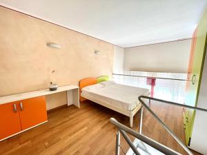 Postel nebo postele na pokoji v ubytování Appartamenti Regina del Mare