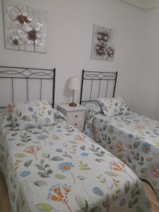 Postel nebo postele na pokoji v ubytování Casa Pili