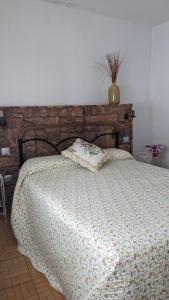 Cama o camas de una habitación en Apartamento Turístico Dalmacia
