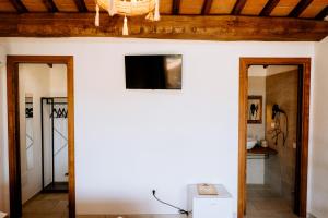 TV a/nebo společenská místnost v ubytování Agriturismo Giù al Pozzo