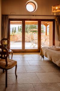 Postel nebo postele na pokoji v ubytování Agriturismo Giù al Pozzo