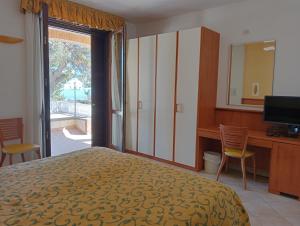 Postel nebo postele na pokoji v ubytování Hotel Bel Sit