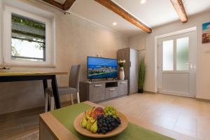 A television and/or entertainment centre at Stancia Rosa - cozy apartment