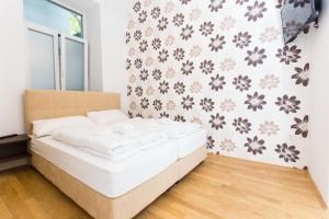 Posteľ alebo postele v izbe v ubytovaní Vienna Stay Apartments Belvedere