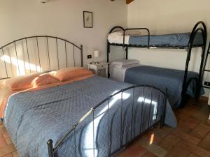 Agriturismo Case in Collina客房内的一张或多张床位
