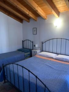 Agriturismo Case in Collina客房内的一张或多张床位