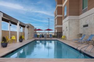 Swimming pool sa o malapit sa Home2 Suites By Hilton Abilene Southwest