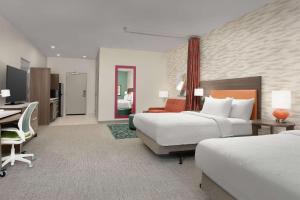 Home2 Suites By Hilton Abilene Southwest客房内的一张或多张床位