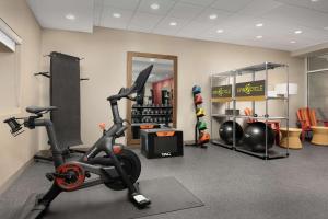 a gym with a treadmill and a exercise bike at Home2 Suites By Hilton Abilene Southwest in Abilene