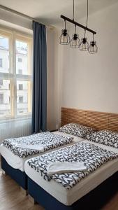 Postel nebo postele na pokoji v ubytování A Plus Hostel - Centrum