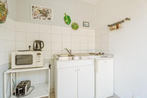 Η κουζίνα ή μικρή κουζίνα στο Chambre d'hote La Chapelle