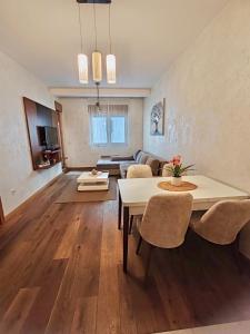 Un lugar para sentarse en Apartman AMIGO & Spa