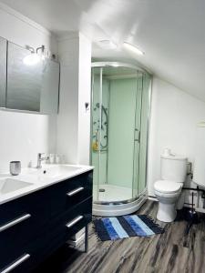 Vannas istaba naktsmītnē Appartement Tahiti Pirae Apiday