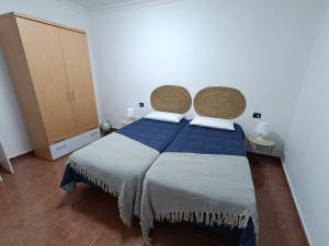 Postel nebo postele na pokoji v ubytování Rincón de Joel Habitación con baño privado