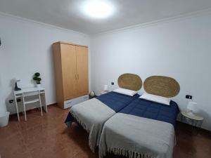 Postel nebo postele na pokoji v ubytování Rincón de Joel Habitación con baño privado