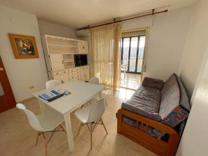 TV a/nebo společenská místnost v ubytování Apartamentos Neptuno Oropesa 3000