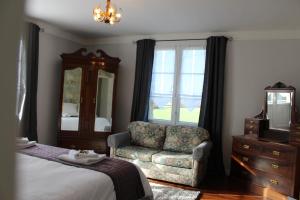 Postel nebo postele na pokoji v ubytování Le Clos Castel + 37 fotografií